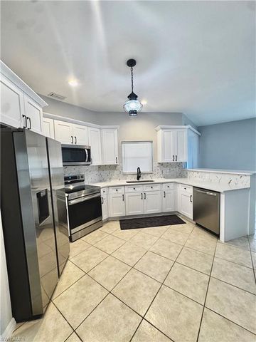 1709 Moore AVE, Lehigh Acres, FL 33972
