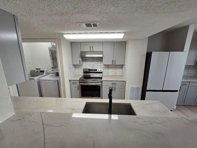 5640 Birchmont Drive C, Houston, TX 77091