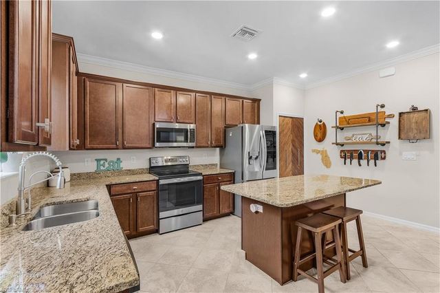 10100 Tin Maple Drive 12, Estero, FL 33928