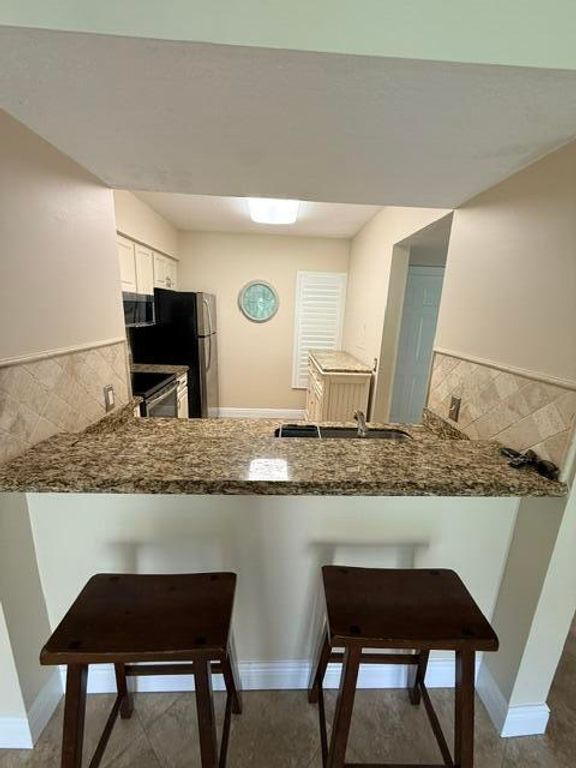 1035 LAKE SHORE Drive 103, Lake Park, FL 33403