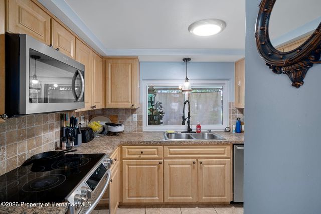 12514 Coffee Hill Row, Hudson, FL 34667