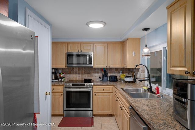 12514 Coffee Hill Row, Hudson, FL 34667