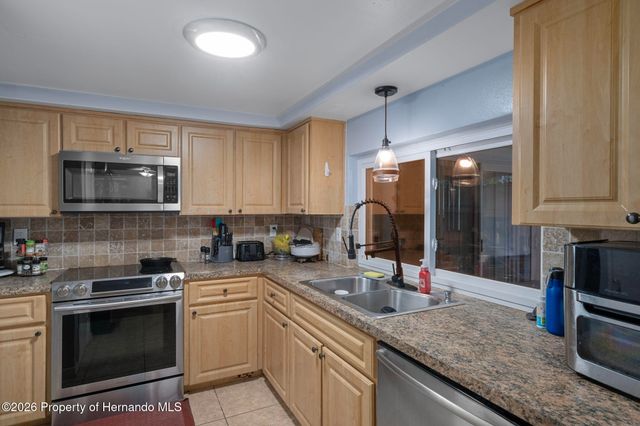 12514 Coffee Hill Row, Hudson, FL 34667