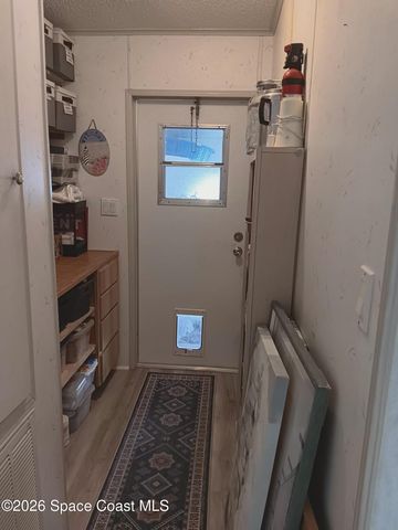 7606 Cedar Bark Road, Micco, FL 32976