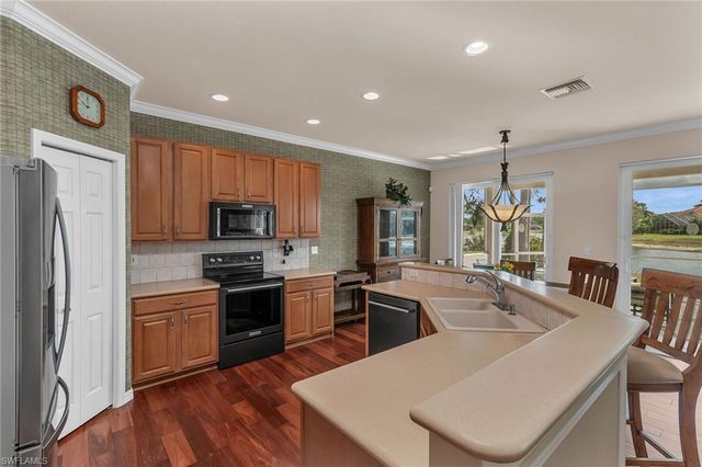 7859 Berkshire Pines DR, Naples, FL 34104