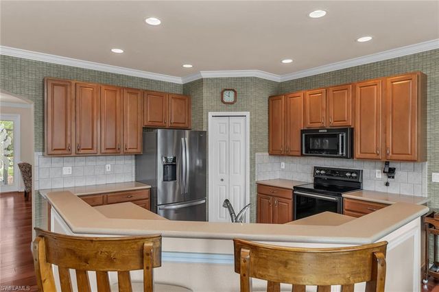 7859 Berkshire Pines DR, Naples, FL 34104