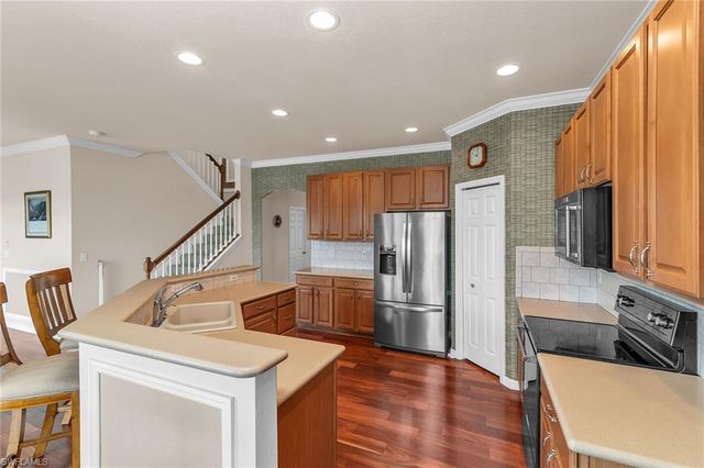 7859 Berkshire Pines DR, Naples, FL 34104