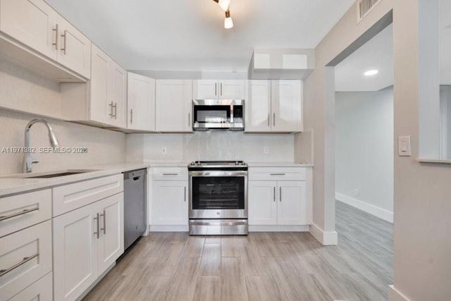 380 Racquet Club Rd 105, Weston, FL 33326