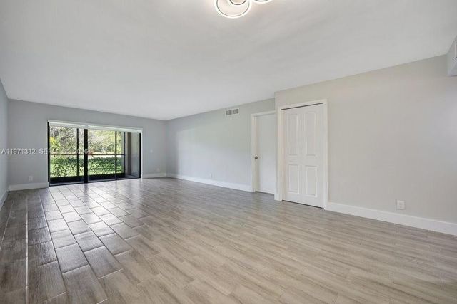 380 Racquet Club Rd 105, Weston, FL 33326