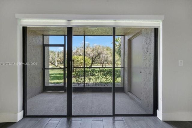 380 Racquet Club Rd 105, Weston, FL 33326