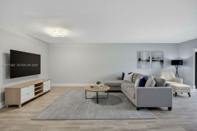 380 Racquet Club Rd 105, Weston, FL 33326