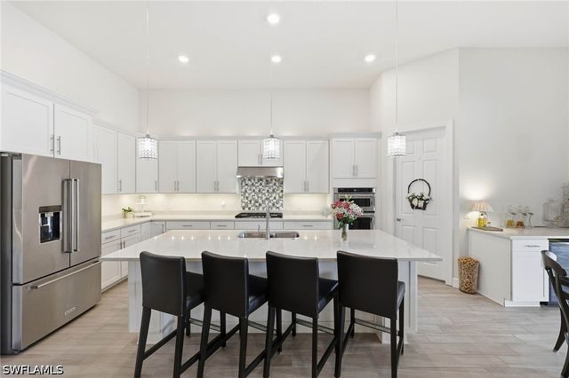 7759 Winding Cypress DR, Naples, FL 34114