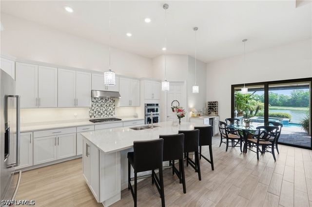 7759 Winding Cypress DR, Naples, FL 34114
