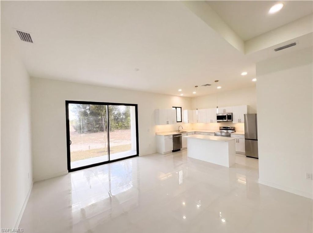 Image 2 of property listing at 2113 NW 41st AVE, Cape Coral, FL 33993