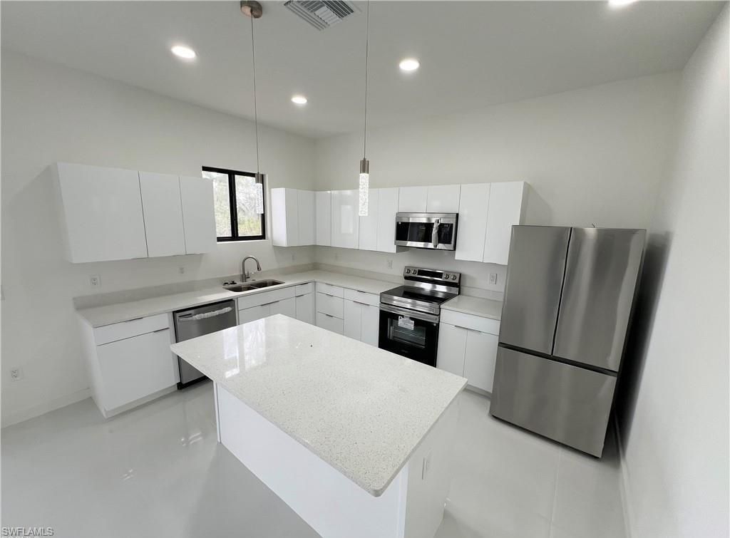 Image 8 of property listing at 2113 NW 41st AVE, Cape Coral, FL 33993