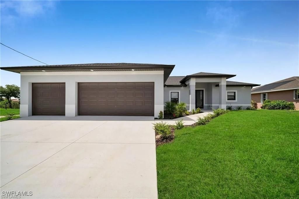 1306 NE 9th AVE, CAPE CORAL, FL 33909 — photo 2
