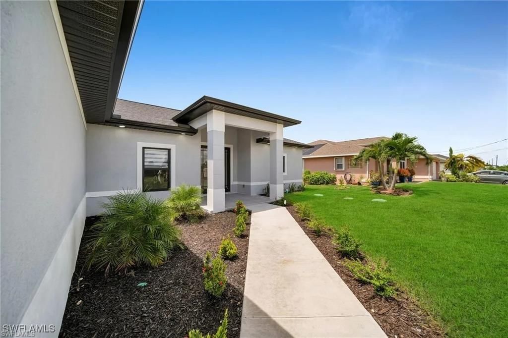1306 NE 9th AVE, CAPE CORAL, FL 33909 — photo 4