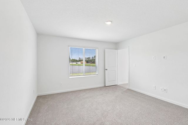 63 WANDERING CREEK Way, Palm Coast, FL 32164