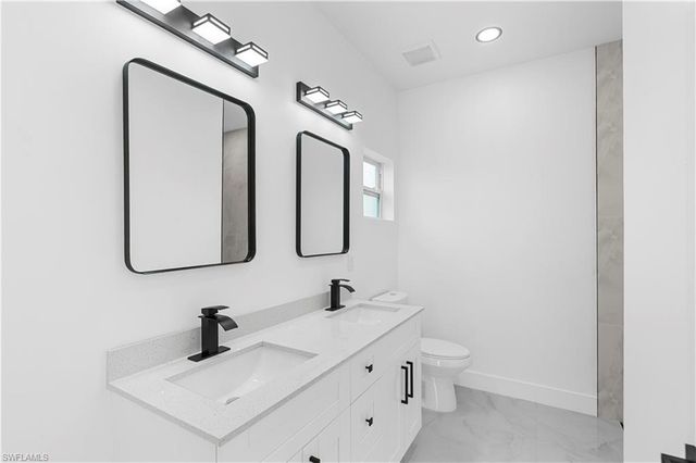 837 Colyer ST E, Lehigh Acres, FL 33974