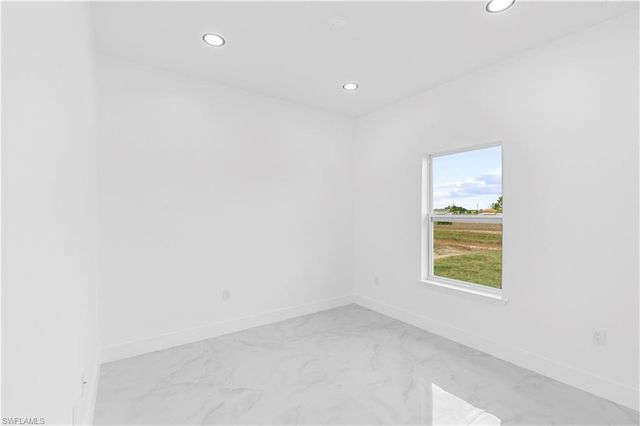 837 Colyer ST E, Lehigh Acres, FL 33974