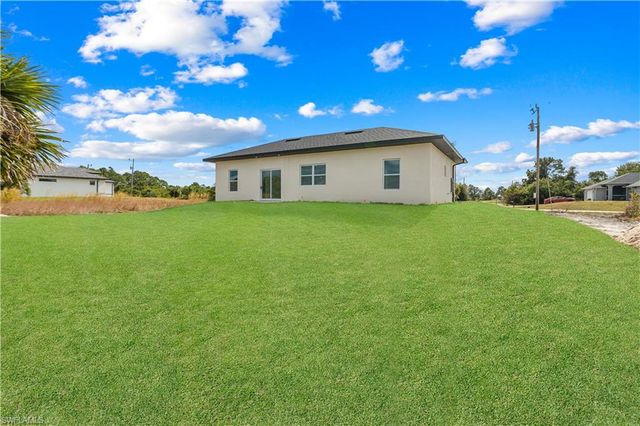 837 Colyer ST E, Lehigh Acres, FL 33974