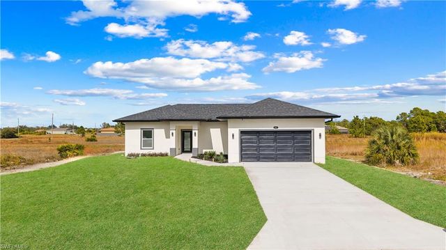 837 Colyer ST E, Lehigh Acres, FL 33974