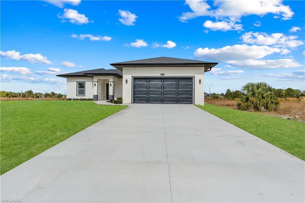 837 Colyer ST E, Lehigh Acres, FL 33974