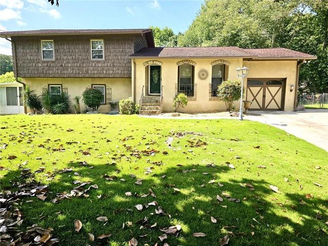 1244 Hickory Wood Drive NE, Woodstock, GA 30188