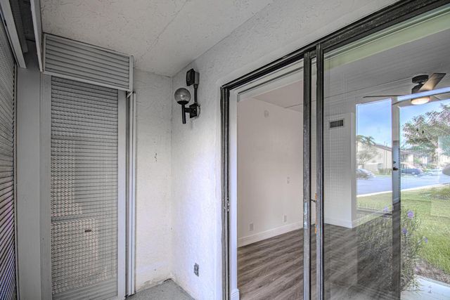 7094 Golf Colony Court 102, Lake Worth, FL 33467