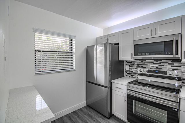 7094 Golf Colony Court 102, Lake Worth, FL 33467