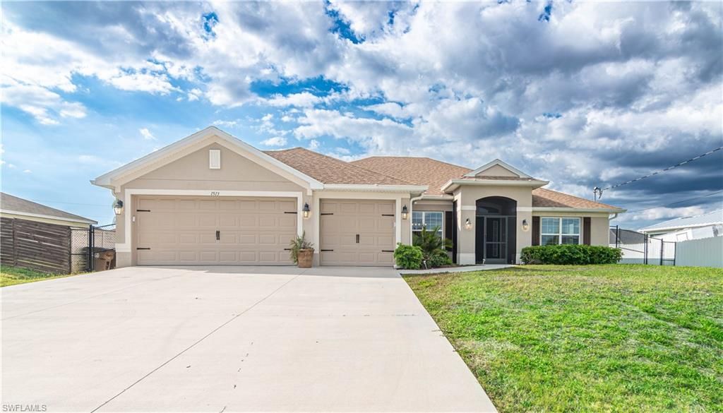 1513 NE 43rd TER, CAPE CORAL, FL 33909 — exterior