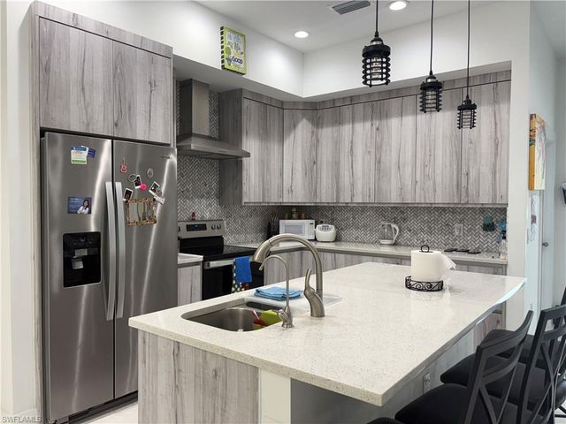 810 Floyd AVE S, Lehigh Acres, FL 33976