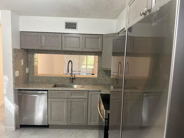 3130 Millwood Terrace 1130, Boca Raton, FL 33431