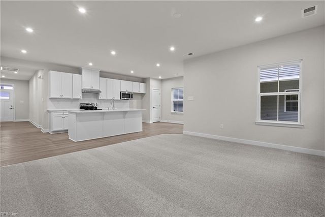 391 Tributary LN, Carrollton, VA 23314