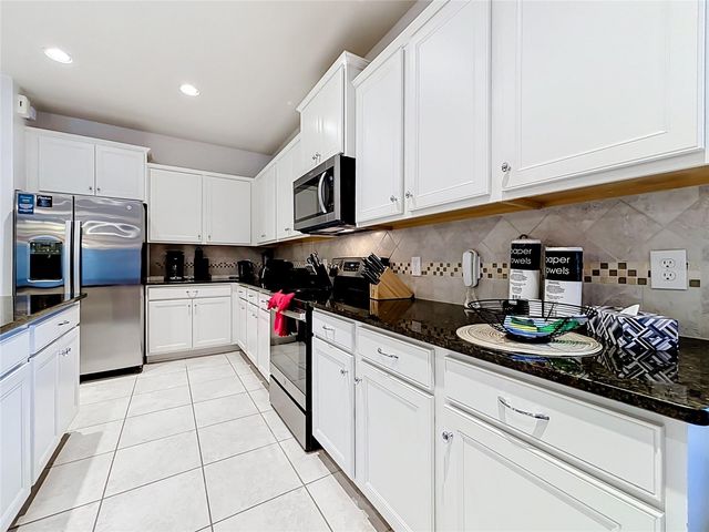 8879 QIN LOOP, Kissimmee, FL 34747