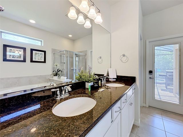 8879 QIN LOOP, Kissimmee, FL 34747