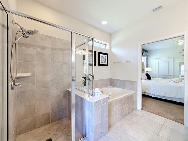 8879 QIN LOOP, Kissimmee, FL 34747