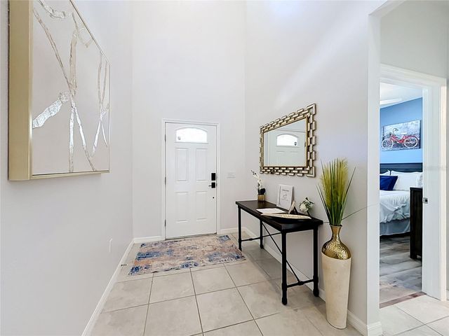 8879 QIN LOOP, Kissimmee, FL 34747