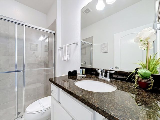 8879 QIN LOOP, Kissimmee, FL 34747