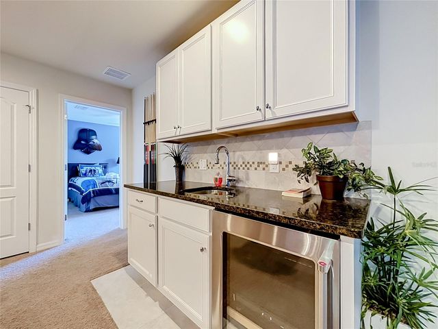 8879 QIN LOOP, Kissimmee, FL 34747
