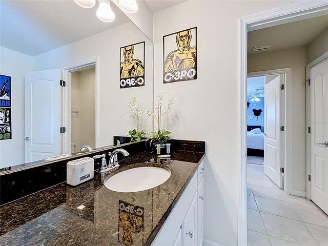 8879 QIN LOOP, Kissimmee, FL 34747