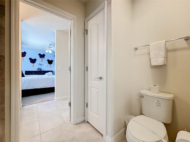 8879 QIN LOOP, Kissimmee, FL 34747