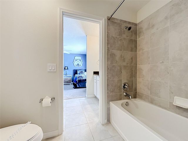 8879 QIN LOOP, Kissimmee, FL 34747
