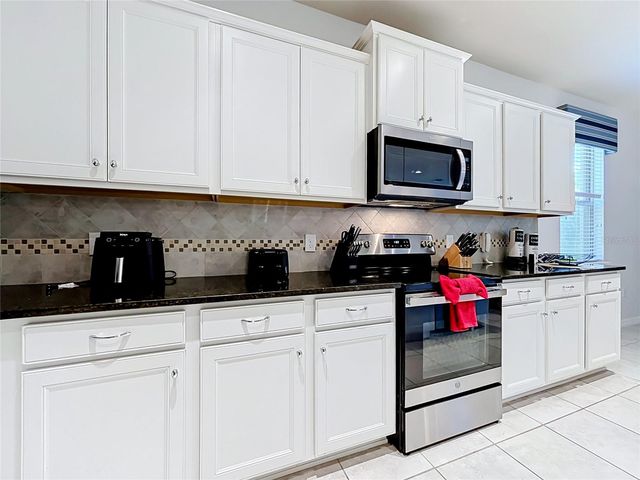 8879 QIN LOOP, Kissimmee, FL 34747