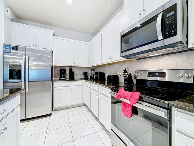 8879 QIN LOOP, Kissimmee, FL 34747