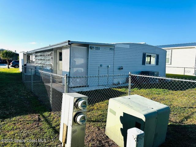 708 Lark Drive, Barefoot Bay, FL 32976