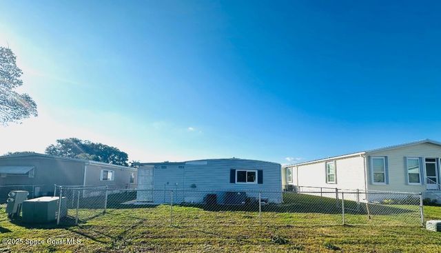 708 Lark Drive, Barefoot Bay, FL 32976