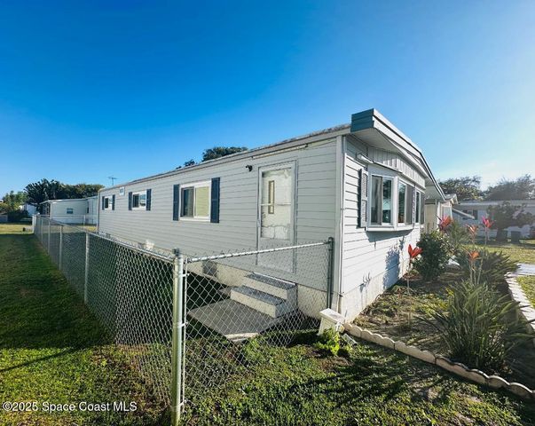 708 Lark Drive, Barefoot Bay, FL 32976