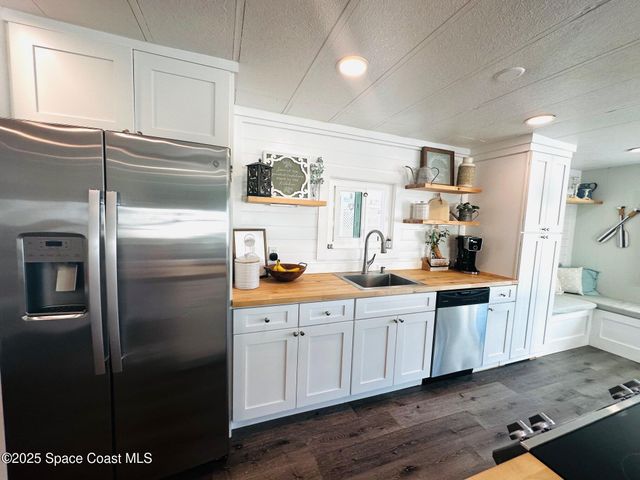 708 Lark Drive, Barefoot Bay, FL 32976