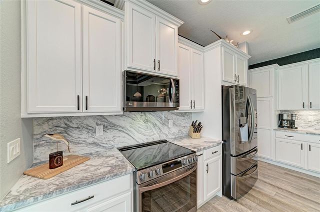 15704 LAKELAND CIRCLE, Port Charlotte, FL 33981